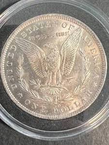 1885-O US MORGAN SILVER DOLLAR IN AIRTITE