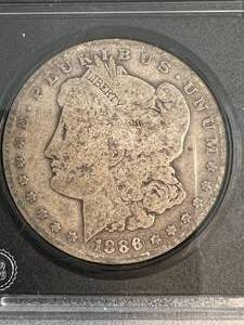 1886-O US MORGAN SILVER DOLLAR SLABBED
