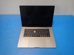 lot 50 image: Apple&nbspMacBookPro14,3 A1707 MPTR2LLA &nbspINTEL(R) CORE(TM) I7-7700HQ CPU  2.80GHZ  16GB RAM  251GB SSD  15 screen with 3360 x 2100 Resolution  Includes IOS and Charger  Marks on screen, missing key