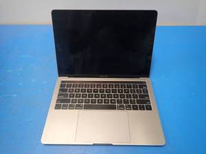 lot 52 image: Apple&nbspMacBookPro15,2 A1989 &nbspINTEL CORE I5-8279U 2.4 Ghz  8GB LPDDR3 RAM  251GB SSD  13.3 screen with 2560 x 1600 Resolution  Includes IOS  No Charger  minor key marks on screen, dents and scratches on case
