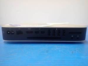 lot 57 image: Apple&nbspMacmini7,1 Mini PC &nbspINTEL CORE I5-4278U 2.6 Ghz  16GB LPDDR3 SDRAM  NO HD  Includes power cable  Minor blemishes on scratches on case