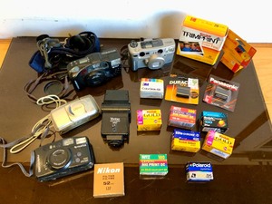 lot 140 image: Estate Lot of Vintage & Newer Cameras Film etc