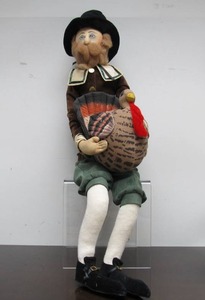 lot 36 image: 30 Thanksgiving Myles Pilgrim Holding Turkey Plush Figure by Joe spencer - Gathered Traditions