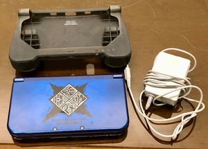 lot 422 image: Excellent Clean Working Nintendo NEW 3DS XL Video Game System - Special Edition - Monster Hunter Generations