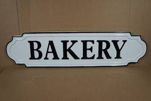 lot 80 image: Raised Metal Bakery Sign