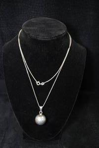 lot 157 image: Sterling Silver Chime Pendant with Chain