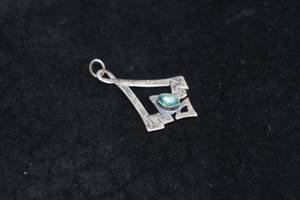 lot 177 image: Silver Tone Pendant with Blue Stone
