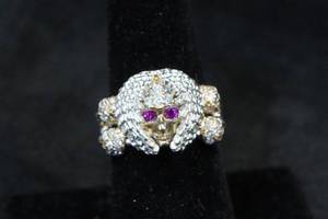 lot 184 image: Sterling Silver Winged Skull Ring with Gold Plated Accents