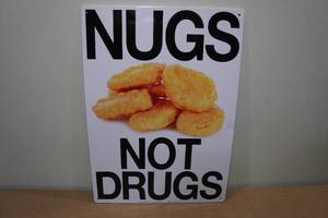 lot 269 image: Nugs Not Drugs Metal Sign