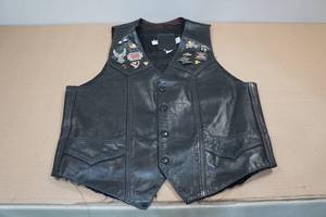lot 305 image: Ladies Black Leather Vest with Vintage Pins -Large