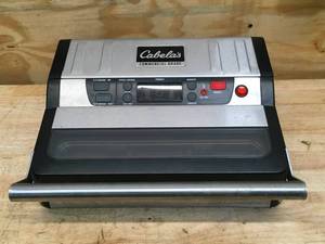 lot 94 image: Cabelas Commercial-Grade Vacuum Sealer Model # 541936 (Retail $299.99)