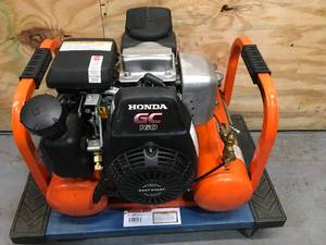 lot 128 image: Industrial Air Contractor Gas-Powered Pontoon Air Compressor Model # CTA5090412
