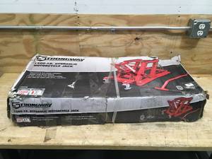 lot 26 image: Strongway 1500 LBS Hydraulic Motorcycle Jack Model # 46238