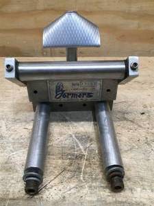 lot 141 image: Formers of Houston machine piece