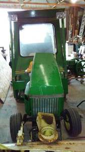 lot 383 image: John Deere 318 Lawn and Garden Tractor with Cab.
