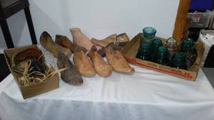 lot 137 image: Glass Insulators, Shoe Stretchers, Military Flight Headphones.