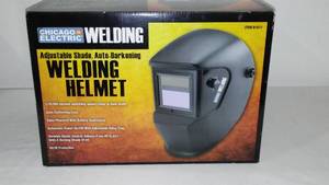 lot 31 image: NEW Chicago Electric Welding Helmet.  Auto Darkening  NEW.