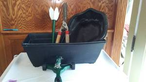 lot 150 image: Planters, Sprinkler And Lopper.