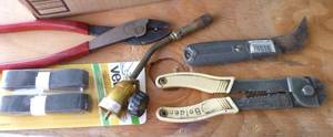 lot 54 image: Box of pliers, snips, wrenches, wire stripper, velcro, torch