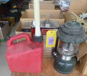 lot 82 image: Coleman lantern, fuel and gas can
