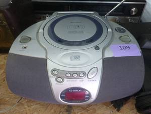 lot 109 image: clock radio and cd player