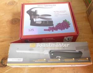 lot 125 image: Electric knife and wine bottle opener