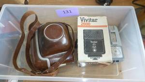 lot 131 image: Vintage Zeiss SLR camera and flash and light meter
