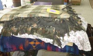 lot 140 image: Stack of blankets and comforters