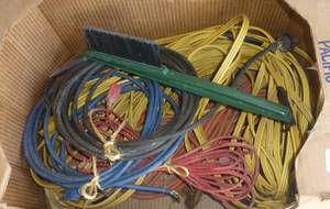 lot 170 image: Box of extension cords and snow scraper with brush