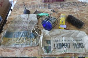 lot 197 image: Vintage nail aprons, sander, oil can, animal comb, wire brush, blue light