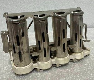 lot 7 image: Vintage McGill 4 Barrel Coin Changer Made in USA