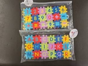 lot 40 image: MN 4 - Lot of Overnight Youth Pants (SM) and Educational Foam Puzzle Mats