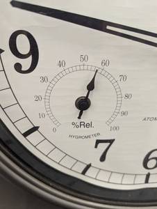 lot 95 image: Barolo Atomic Wall Clock with Hygrometer and Thermometer
