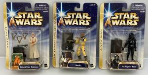 lot 16 image: Misc. 2004 STAR WARS  Action Figures (NOC)