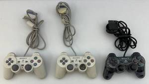 lot 60 image: Misc. Vintage SONY Playstation Controllers