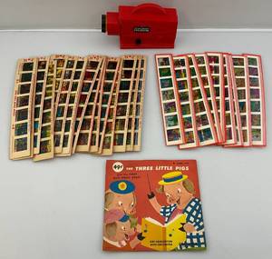 lot 70 image: 1962 Kenner Give A Show Projector With Cartoon Slides & More