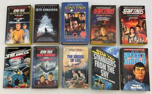 lot 138 image: Misc. Vintage STAR TREK Paperback Books