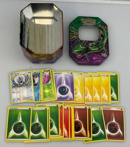 lot 205 image: Unsorted Pokemon Cards In Misc. Tin