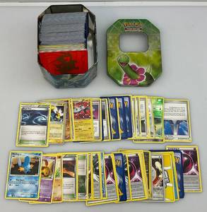 lot 206 image: Unsorted Pokemon Cards In Misc. Tin