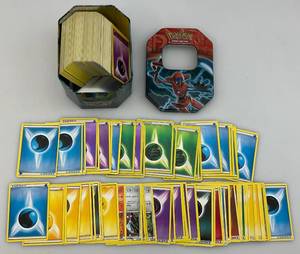 lot 208 image: Unsorted Pokemon Cards In Misc. Tin