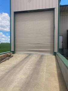 lot 6 image: Fully working roll up door 13 feet wide x 14 ft tall with operator
