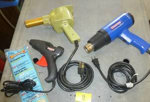 lot 9 image: Two heat guns and 1 glue gun with glue sticks