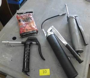 lot 10 image: 3 grease guns and grease
