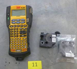 lot 11 image: DYMO PL200 label maker and a couple of rolls of label tape