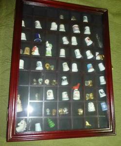 lot 47 image: Large glass front shadow box full of thimbles