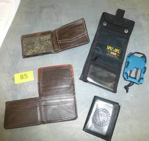 lot 85 image: 4 wallets and a cellphone carrier