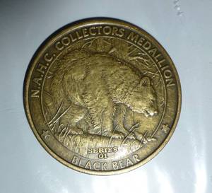 lot 106 image: 50 Black bear medallions