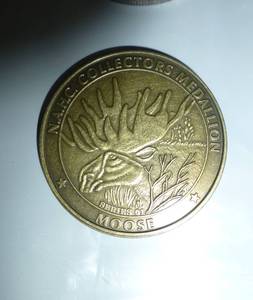 lot 109 image: 50 Caribou medallions