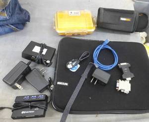 lot 146 image: neoprene tablet bag and various adapters for DVI to HDMI, multiple card reader etc