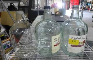 lot 158 image: THREE 1 gallon jugs